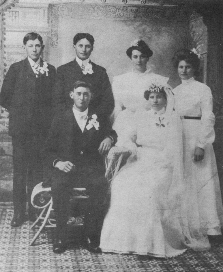 Wedding Picture of Peter and Agnes Rutten, October 20, 1903. Seated—Peter and Agnes Rutten Standing—Left to right: Leonard and John Rutten, brothers of the groom; Margaret Neibauer (now Mrs. John Rutten) and Mary Dohman sister of the bride.